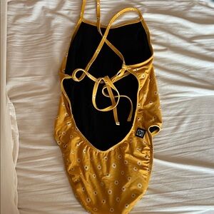 Jolyn Jackson 4 Daisy Print Tie Back Onesie